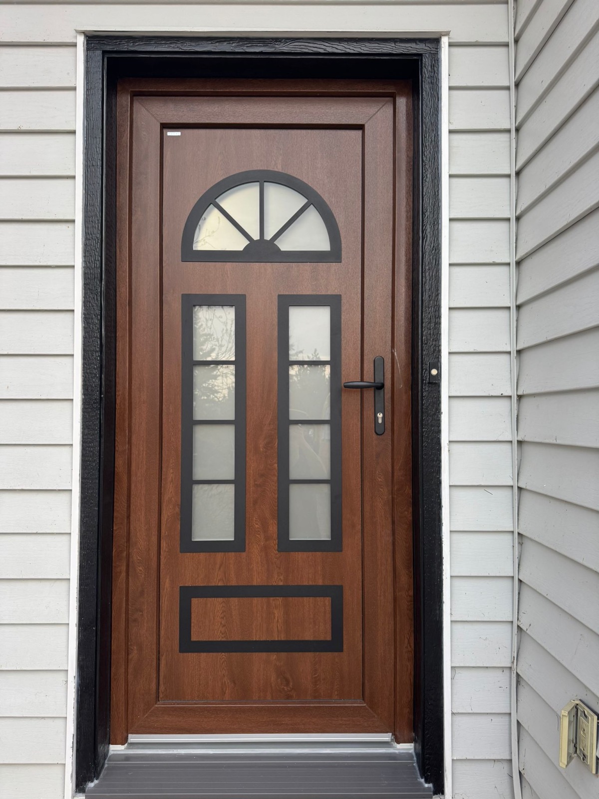 European entry door with compression seal — close-up